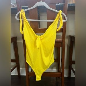 Yellow adjustable tie shoulder bodysuit